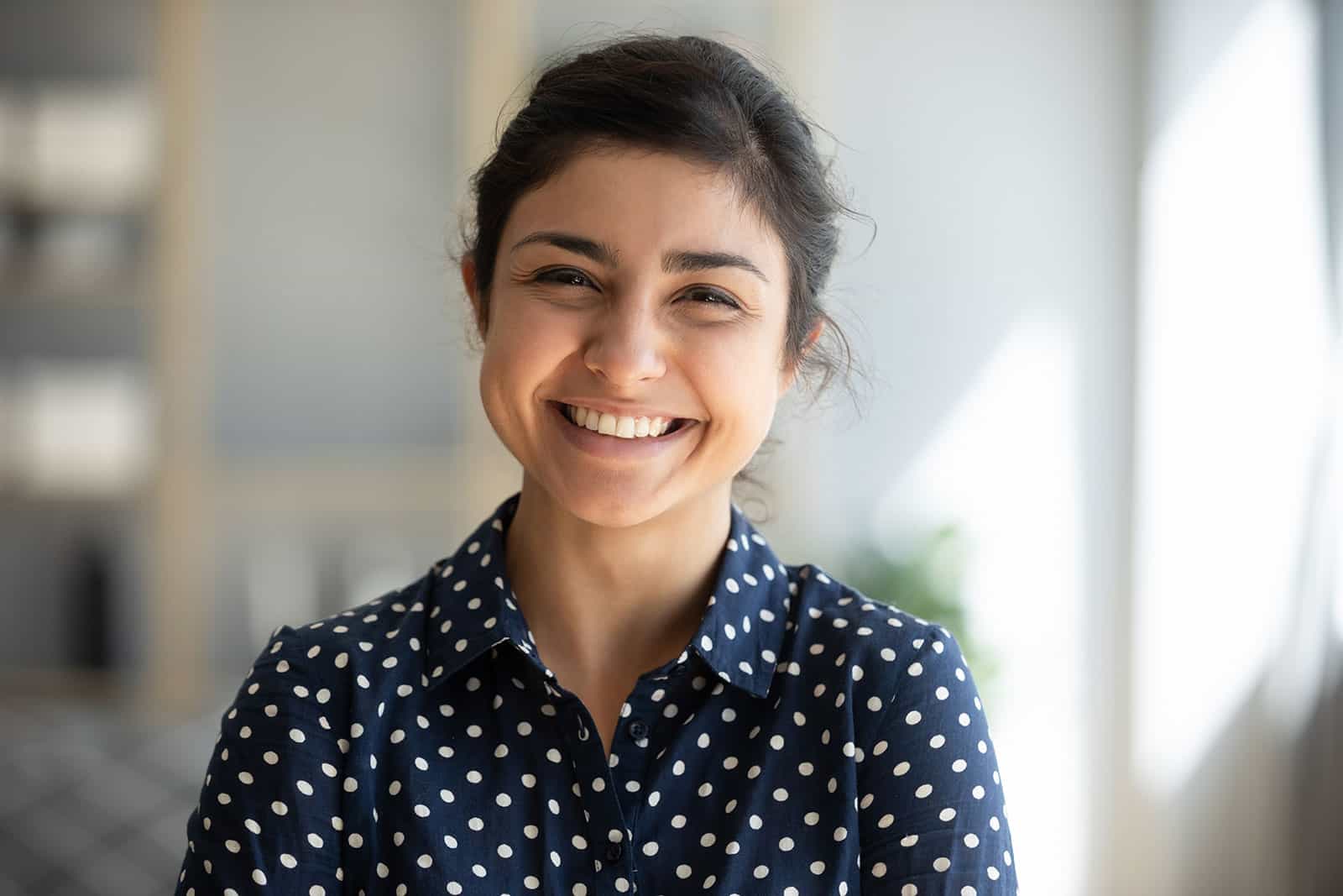 Female audiologist smiling