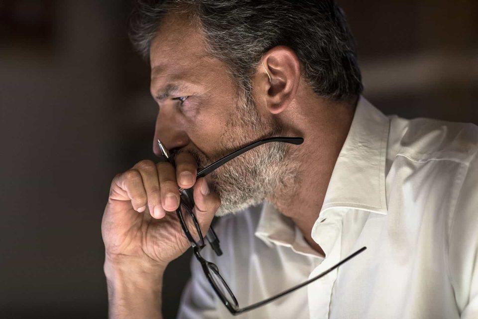 Man wearing Widex Moment receiver in the canal hearing aid