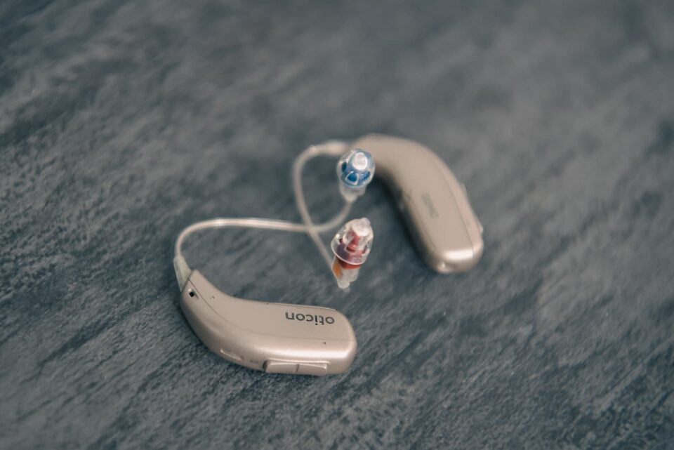 pair of Oticon RIC hearing aids